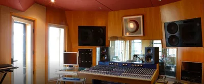TL Audio VTC mixing console facing the monitors and the window into the live room